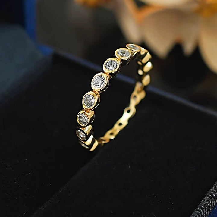Classic Round Cut Eternity Golden Tone Band Carly Jewelry